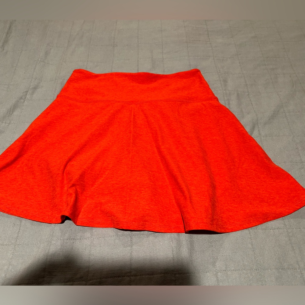 Bright red Beyond Yoga tennis skirt